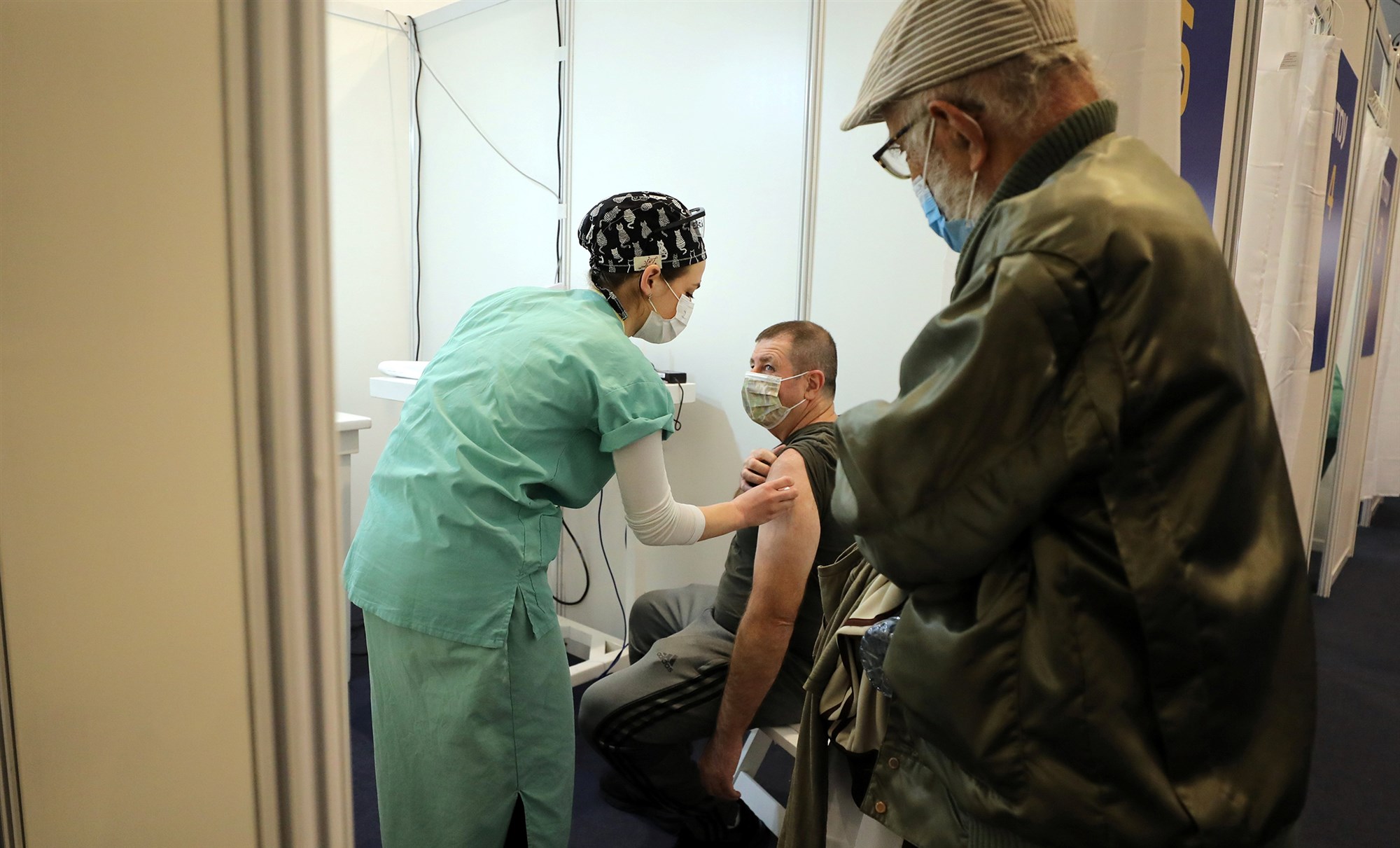 Paralyzed by Covid-19, Israel bids to be first country to vaccinate its way to safety